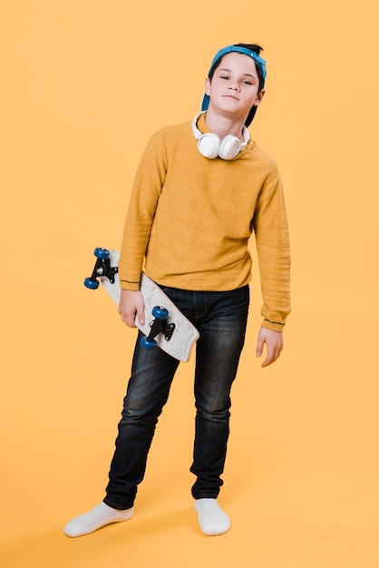 Free Photo medium shot of modern boy with skateboard