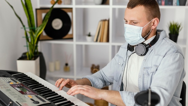 Medium shot musician wearing mask