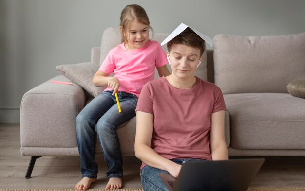 Medium shot parent working at home