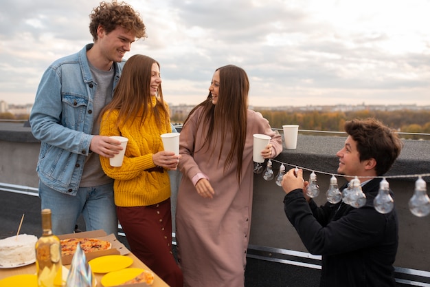 Free photo medium shot people celebrating together