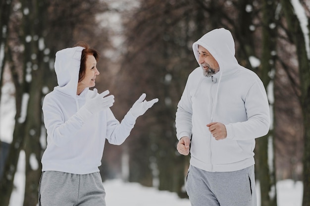 Medium shot people jogging together