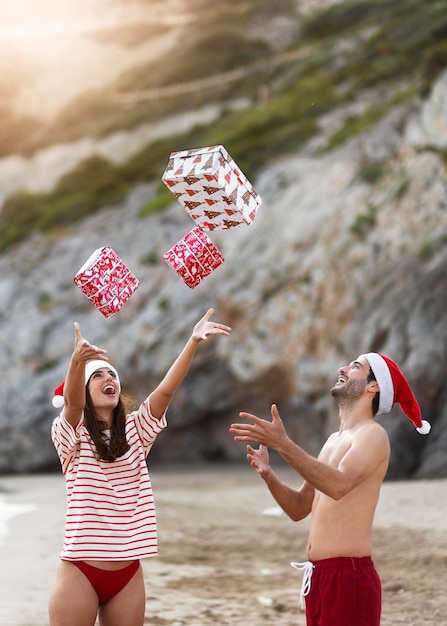 Free Photo medium shot people throwing gifts up