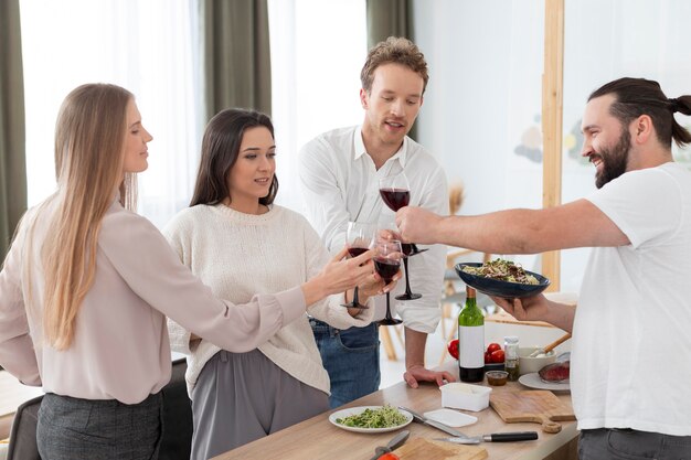 Medium shot people with wine glasses