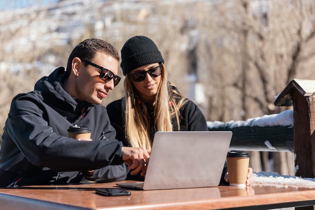 Medium shot people working on laptop