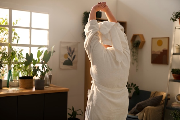 Medium shot plus-sized woman practicing selfcare