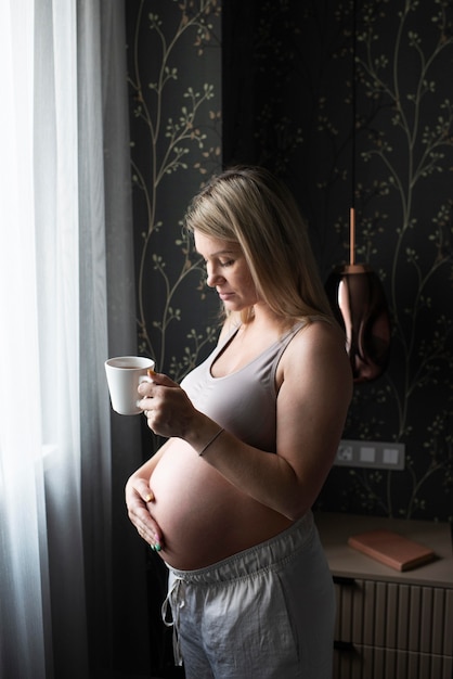 Medium shot pregnant woman