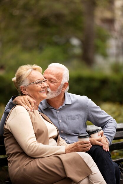 Medium shot senior couple in nature