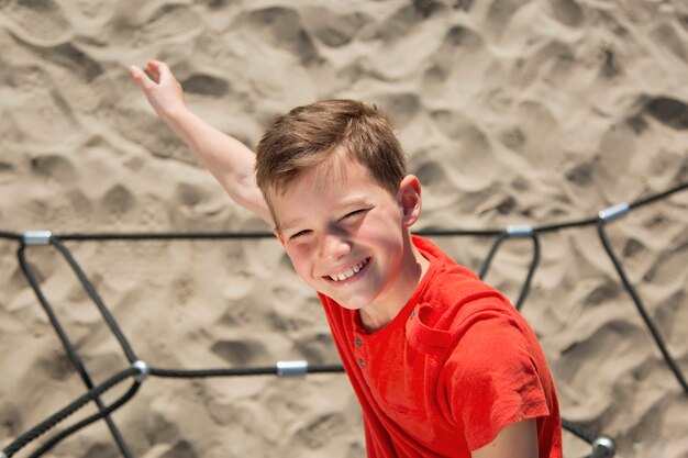 Medium shot smiley boy outdoors