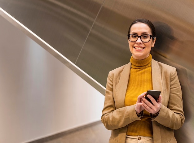 Medium shot smiley business woman