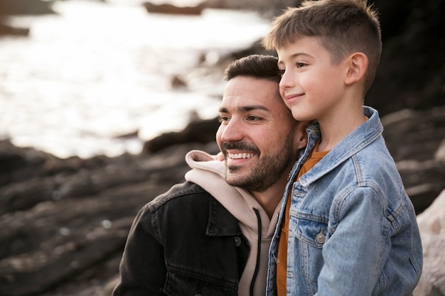 Medium shot smiley father and kid