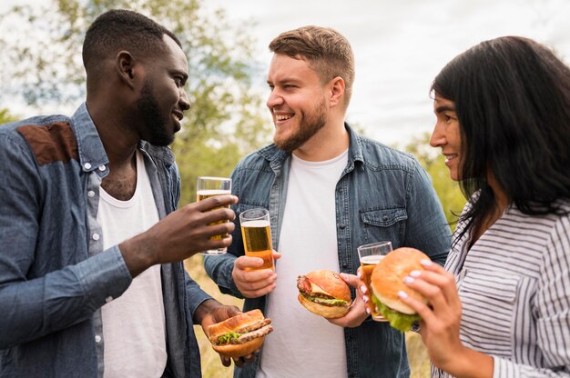 Medium shot smiley friends with food