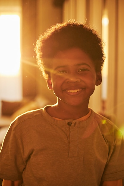 Free photo medium shot smiley kid at home