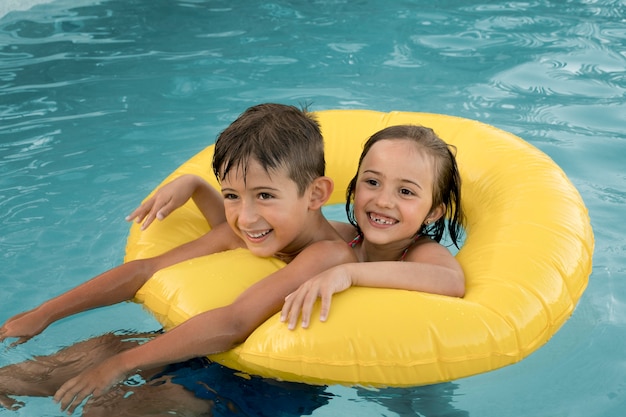 Medium shot smiley kids with lifebuoy