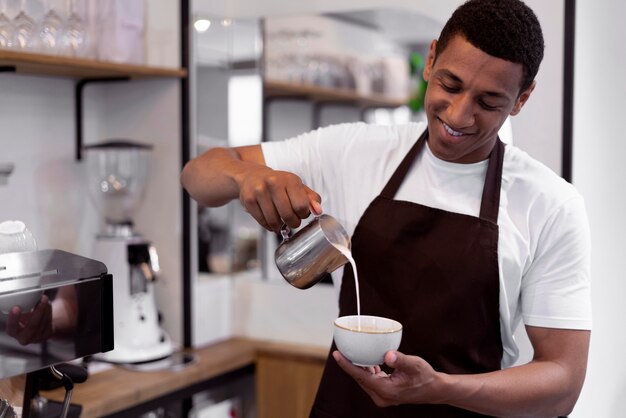 Medium shot smiley man making coffee