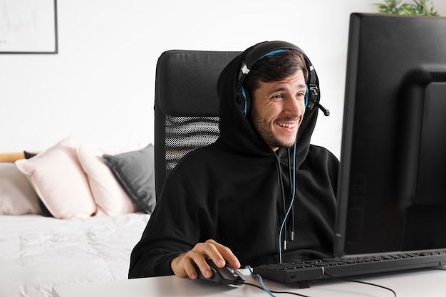 Medium shot smiley man playing game