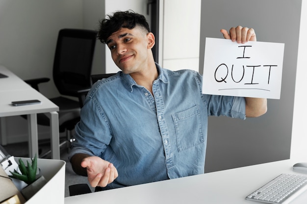 Free Photo medium shot smiley man quitting job