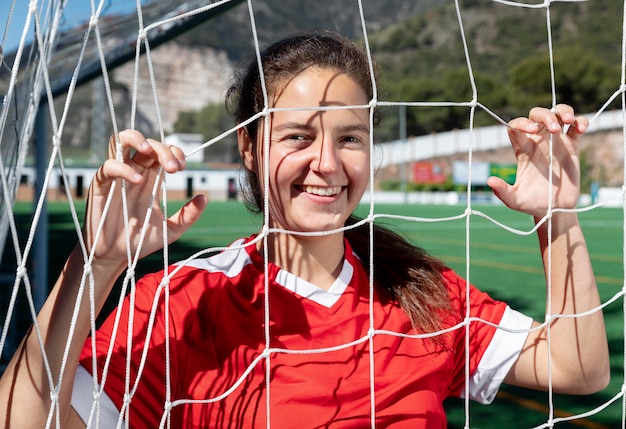 Medium shot smiley woman holding net