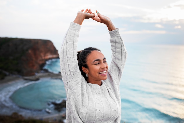 Free photo medium shot smiley woman in nature