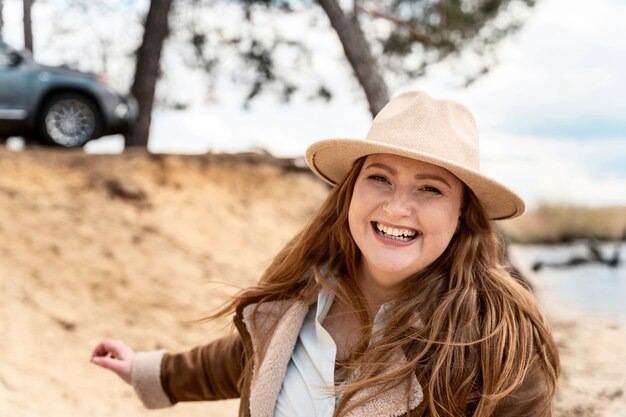 Medium shot smiley woman outdoors