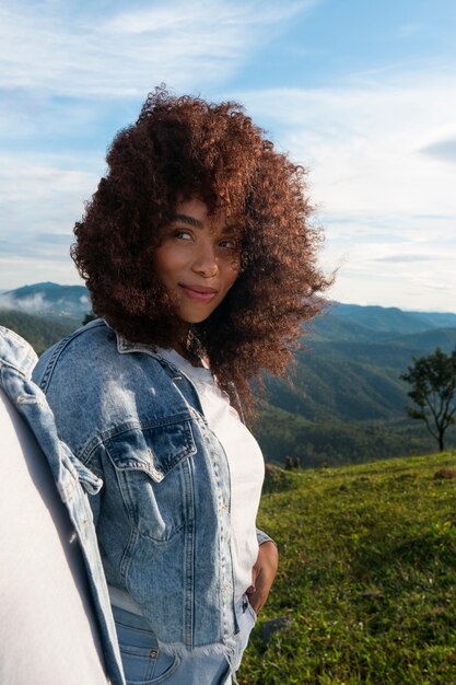 Medium shot smiley woman outdoors