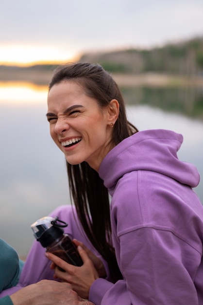 Free Photo medium shot smiley woman outdoors