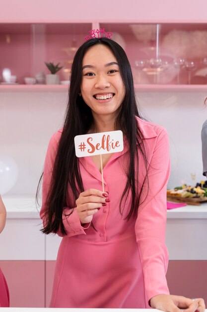 Medium shot smiley woman at party