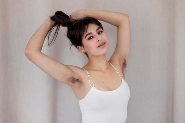 Medium shot smiley woman with body hair