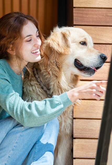 Medium shot smiley woman with dog