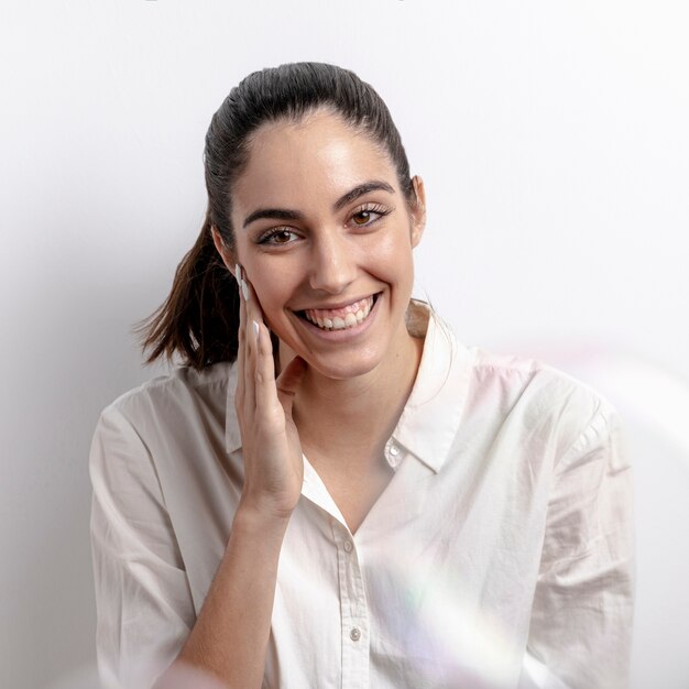 Medium shot smiley woman with white background