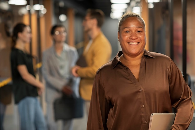 Free photo medium shot smiley woman at work