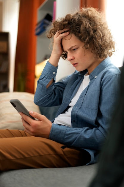 Medium shot suffering teenager being cyberbullied