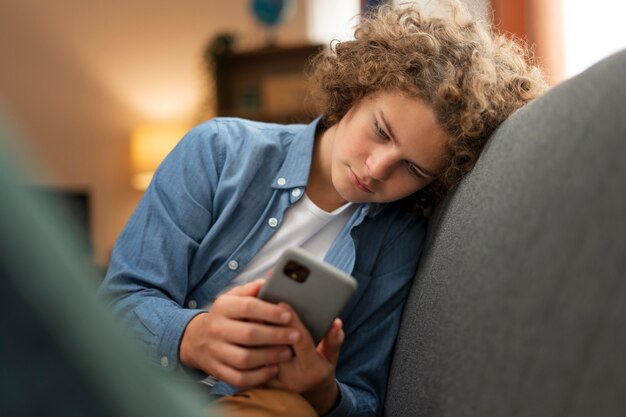 Medium shot suffering teenager being cyberbullied