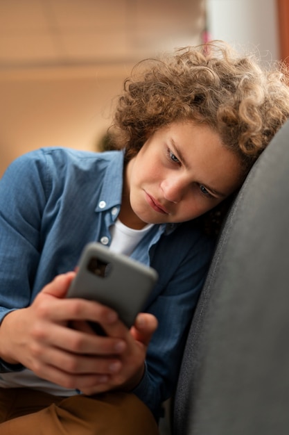 Medium shot suffering teenager being cyberbullied