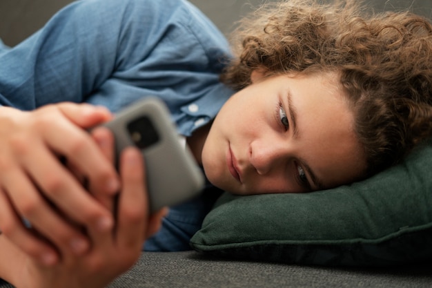 Medium shot suffering teenager being cyberbullied