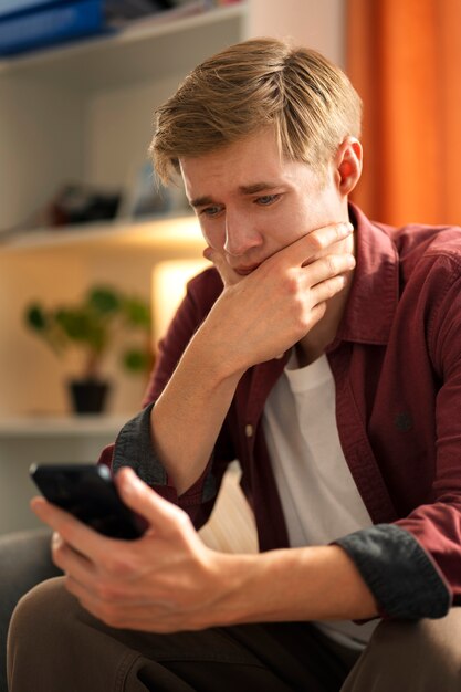 Medium shot suffering teenager being cyberbullied