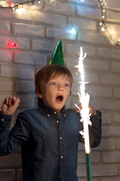 Medium shot surprised kid with firework