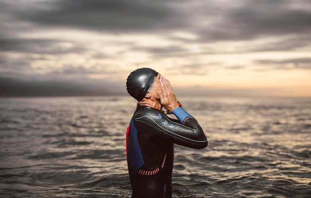 Medium shot swimmer at seaside