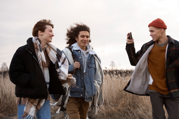 Medium shot teenagers outdoors