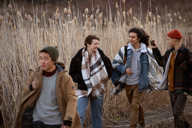 Medium shot teenagers walking together