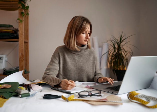 Free photo medium shot woman creating vision board