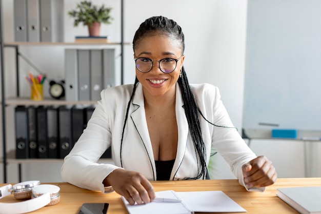 Medium shot woman at desk