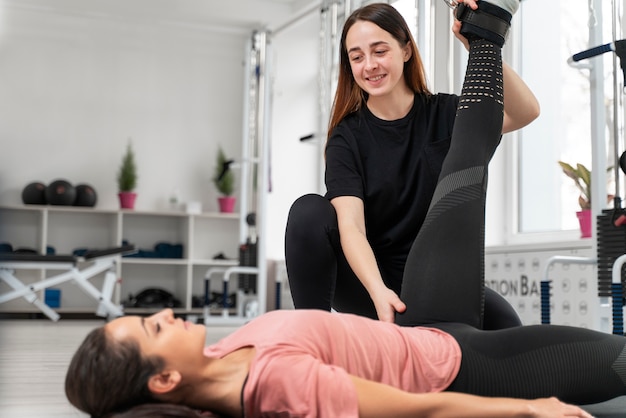 Medium shot woman exercising