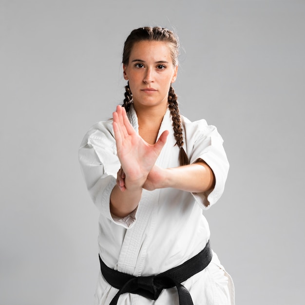 Free photo medium shot of woman fighter front view