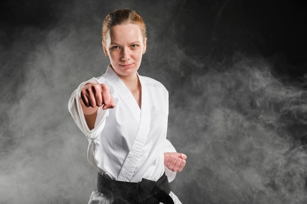 Medium shot of woman fighter