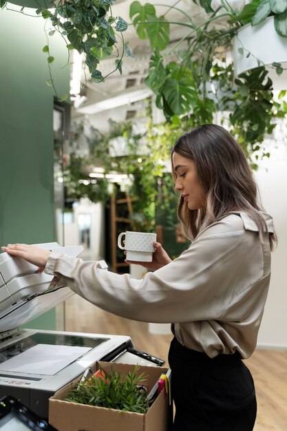 Medium shot woman holding coffee cup