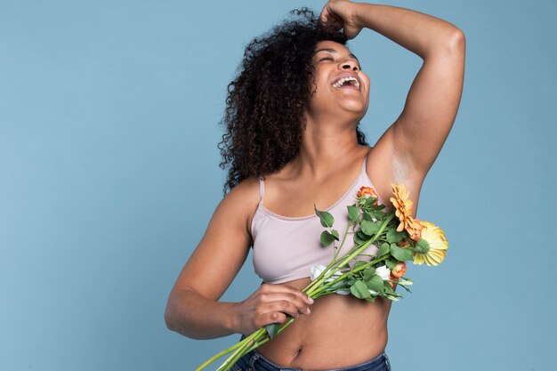 Medium shot woman holding flowers bouquet