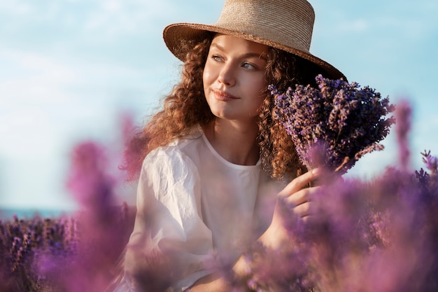 Free Photo medium shot woman holding lavender