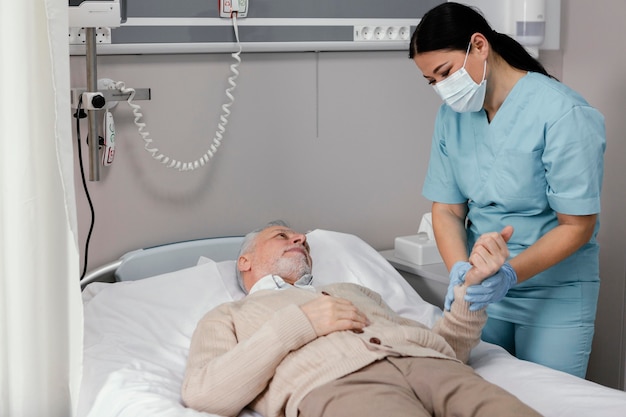 Medium shot woman holding man's hand