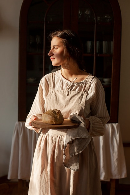 Free Photo medium shot woman living at farmhouse