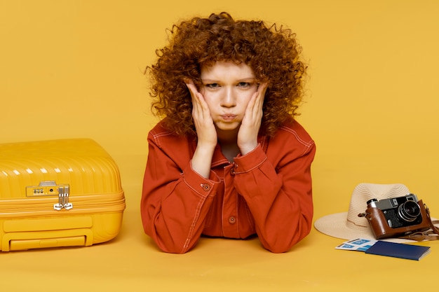 Medium shot woman posing with baggage